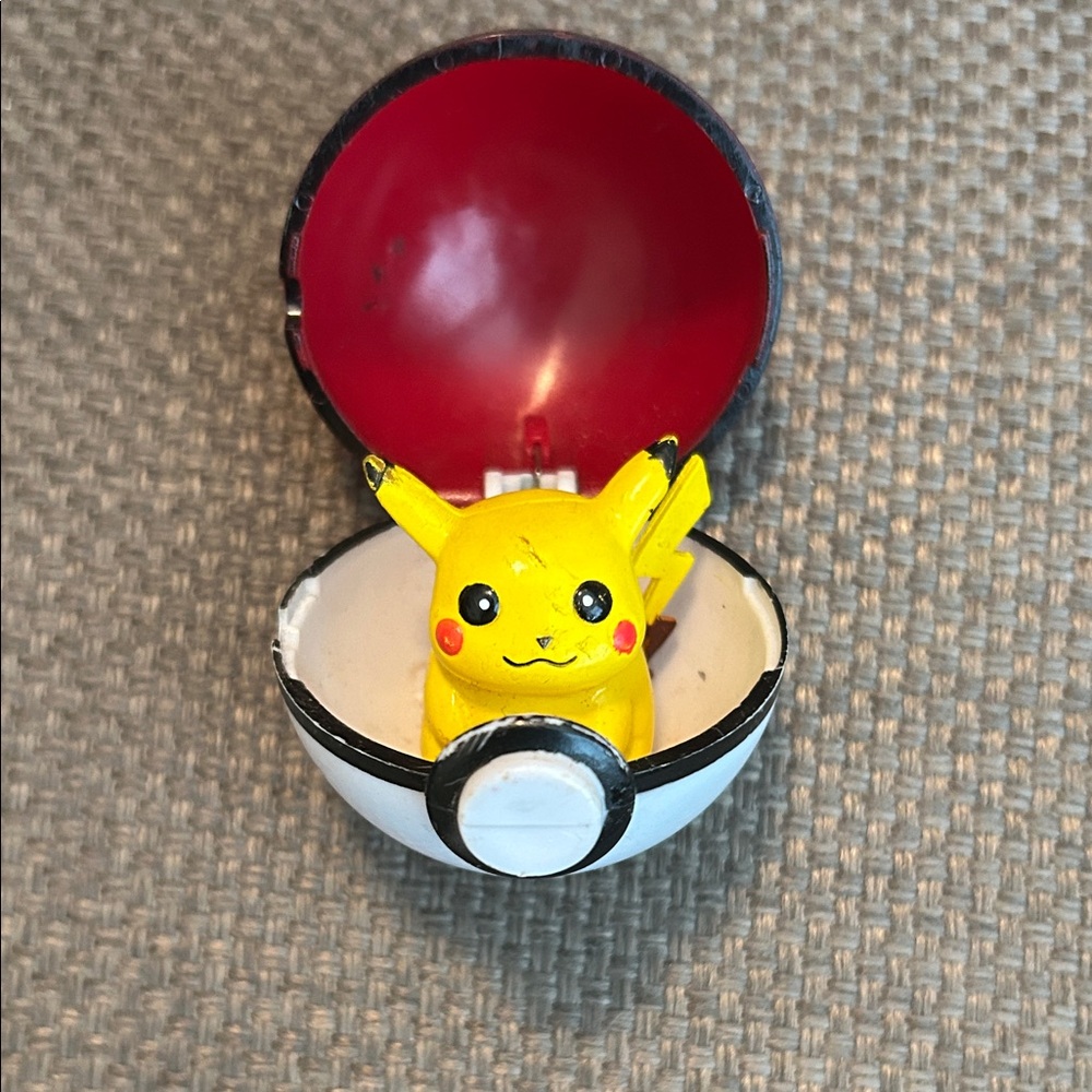 Pikachu Figure in Poké Ball Display